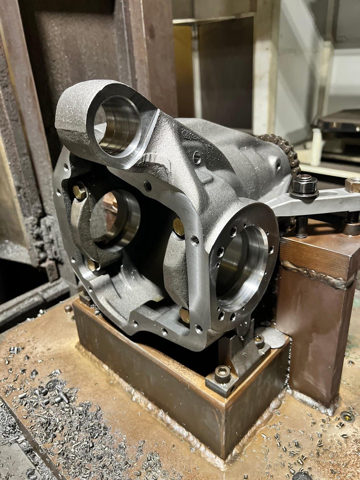 Ductile iron differential housing on a machining fixture.